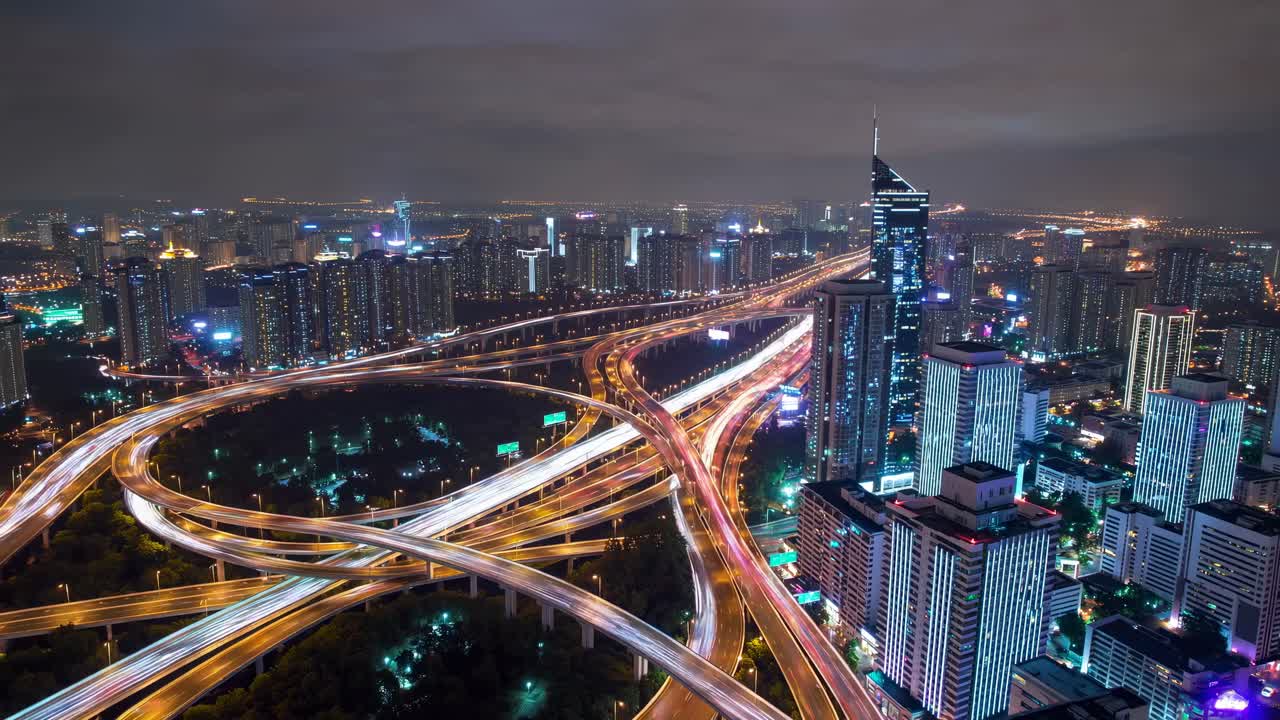 Night cityscape of a highway intersection in a major city