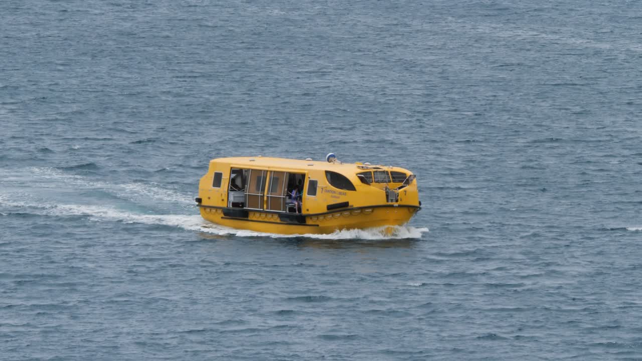 Life boat of a cruise ship bringing passengers to the beach of Mystery Island,Vanuatu.