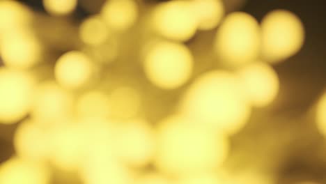 fondo parpadeante borroso de navidad o año nuevo. estandarte desfocado parpadeando amarillo o dorado. 4k