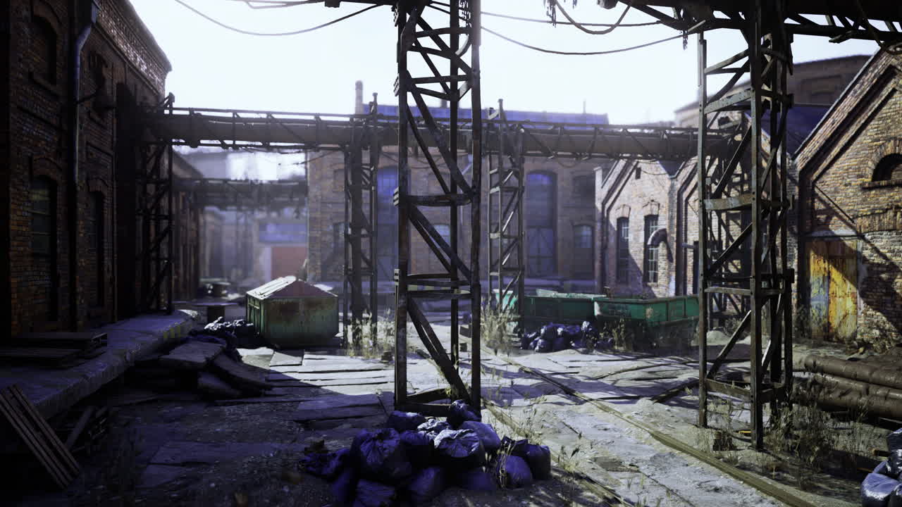 Urban exploration of a forgotten factory complex under bright sunlight