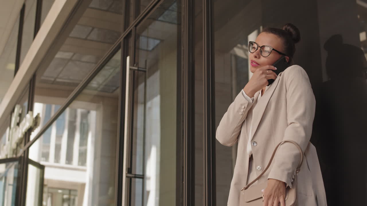 Business Lady Answering Phone Call Outdoors
