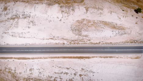 aerial view of a road through a desert landscape