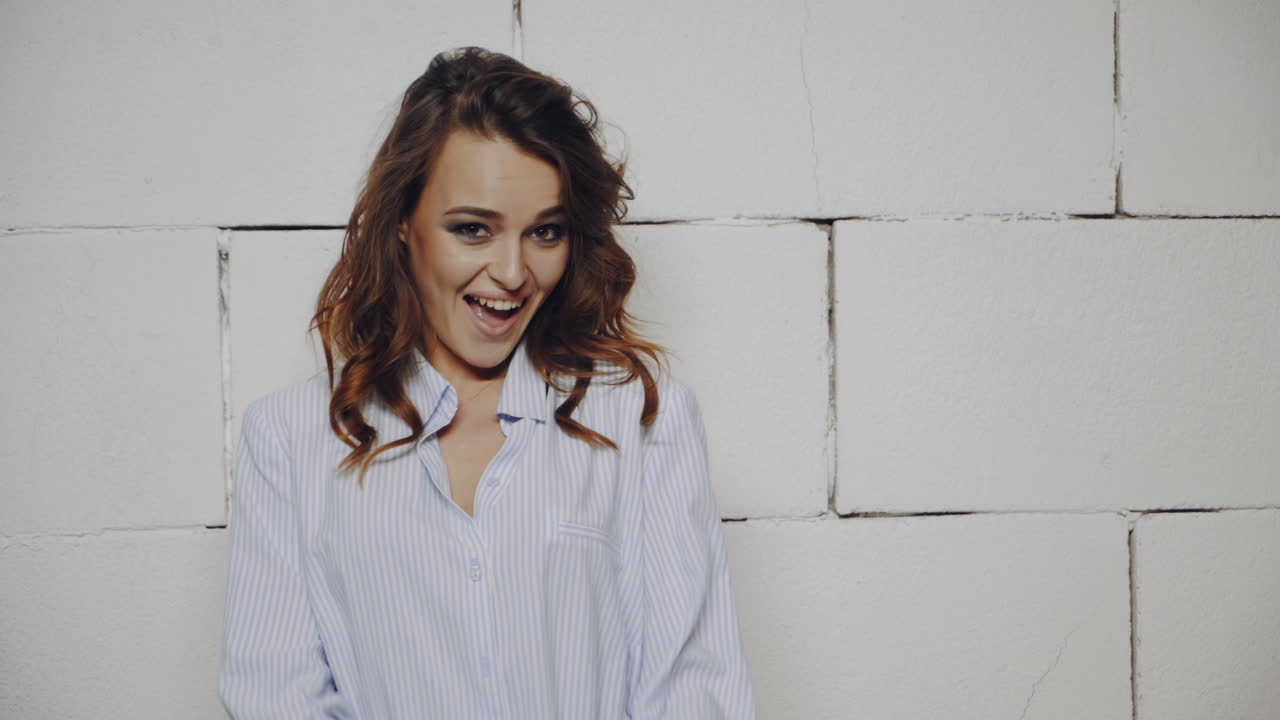 Woman in light blue shirt