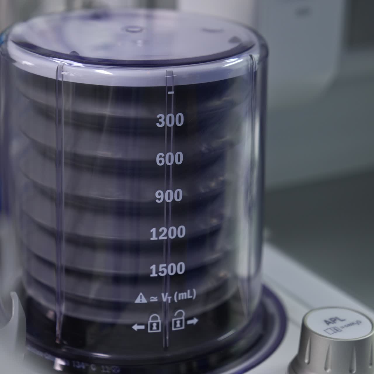 Falling and rising pump of an artificial lung ventilation machine. Equipment pumping air for the patient in surgery room