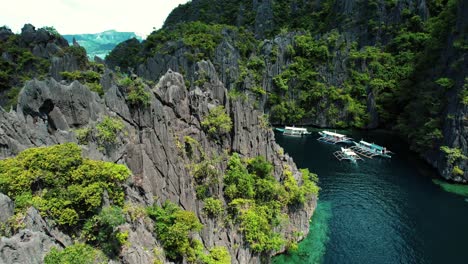 4k-Cinematic-Drone-of-Catamarans-in-Twin-Lagoon,-Coron,-Palawan-Philippines