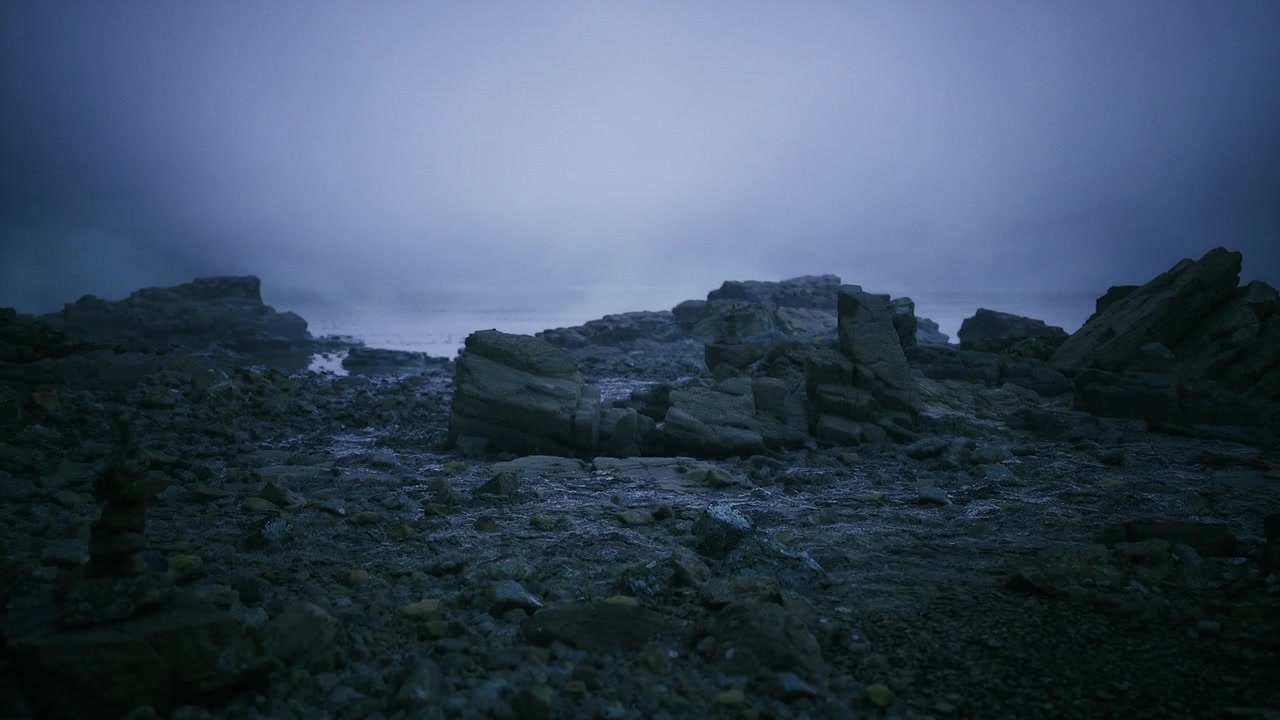 Cinematic twilight scene with fog over rugged rocks and pebbles