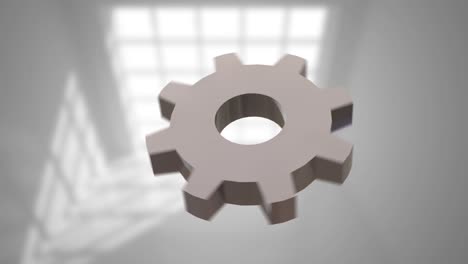 Animation-of-cog-spinning-on-grey-background