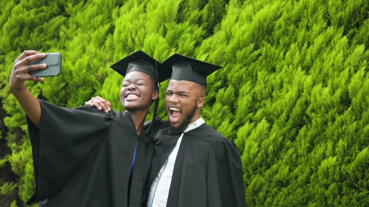 Subscribe bar sliding in spurring two grads exchanging diploma posing selfie with phone for channel