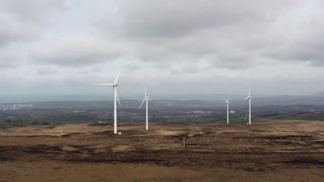 Aerial-footage-of-wind-turbines-in-a-field