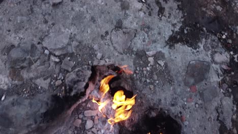 eternal flames: natural gas burning out of stone rocks at mount chimaera, turkey