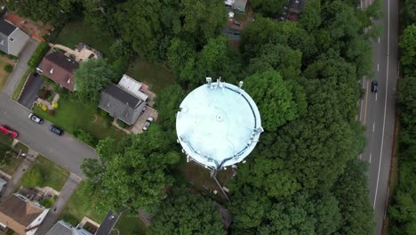 An-aerial-view-of-a-residential-neighborhood-on-Long-Island,-NY-with-green-trees