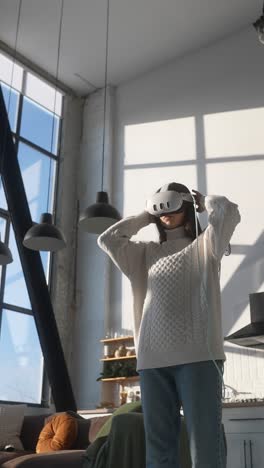 young woman using vr headset at home