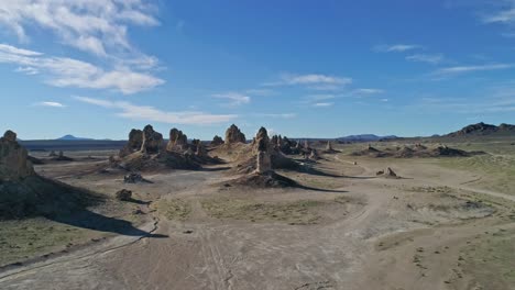 High-aerial-view-moving-slowly-toward-Trona-Pinnacles-rock-formations-on-a-sunny-morning