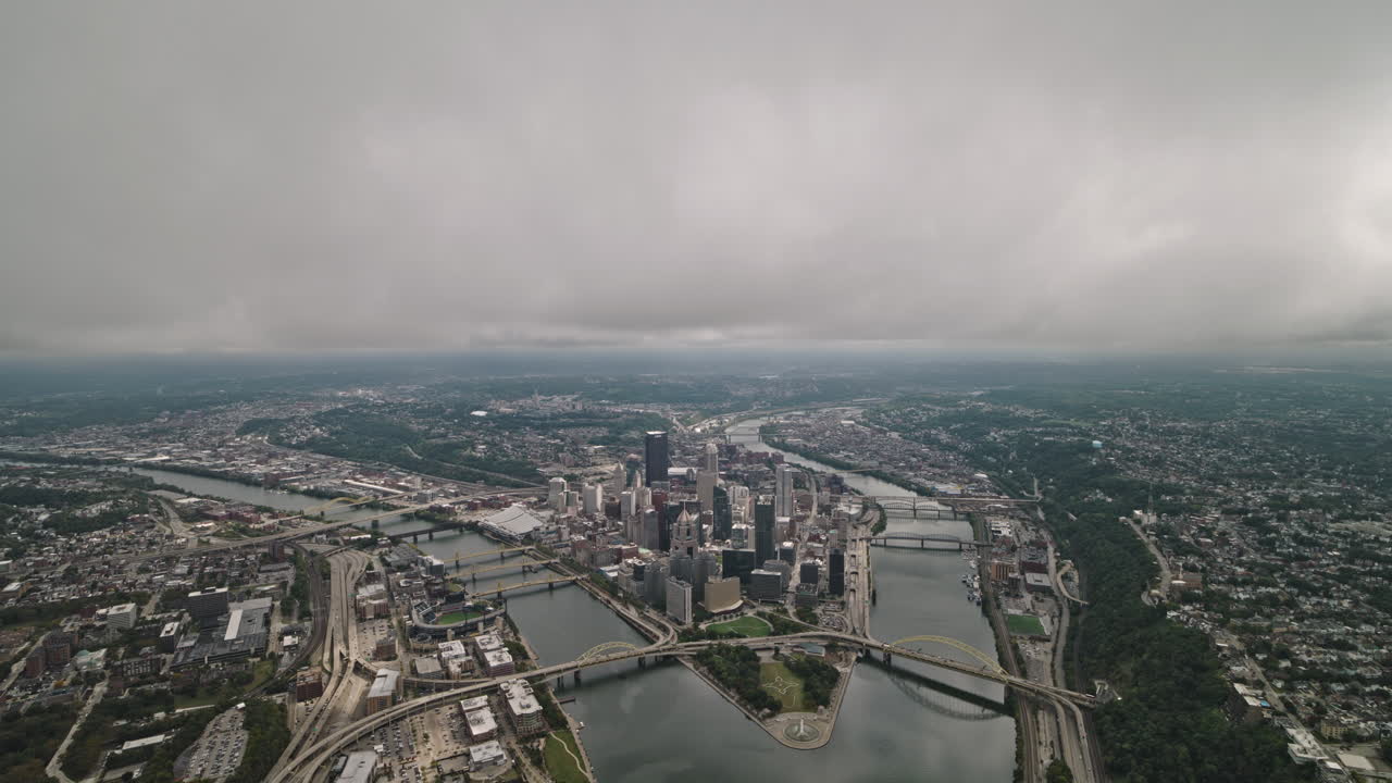Pittsburgh Pennsylvania Aerial v85 cinematic high altitude flyover Ohio river through the dense fog, reveals downtown cityscape under a cloudy sky - Shot with Inspire 3 8k - Sept 25th 2023