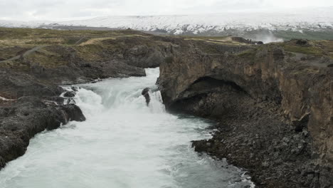 blue slow motion glacial river in iceland