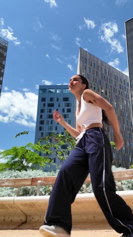 woman dancing in an urban setting