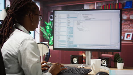 close up of person using coding application to write and test code