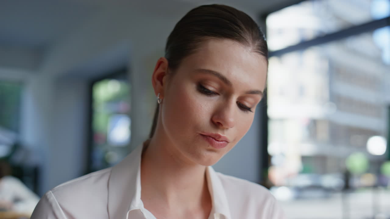 Pensive businesswoman thinking issue sitting workplace closeup. Thoughtful woman