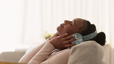 woman relaxing with headphones