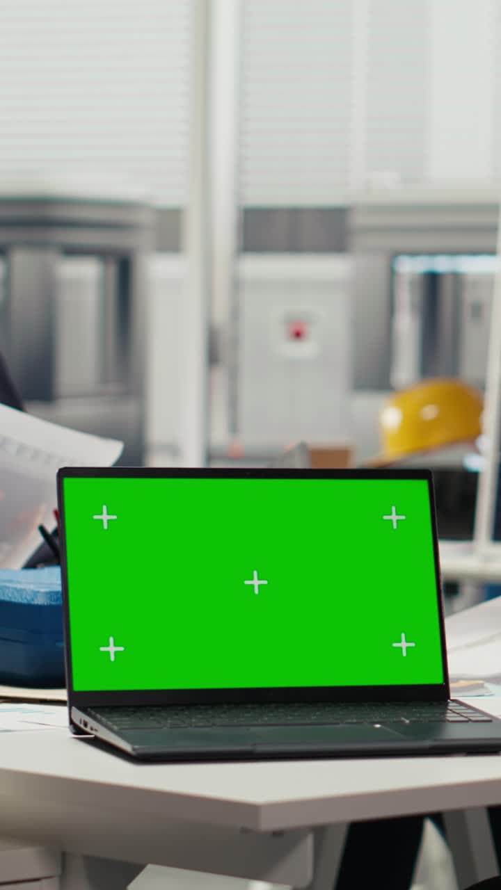 Vertical video Researcher analyzes prototypes using laptop to optimize energy production