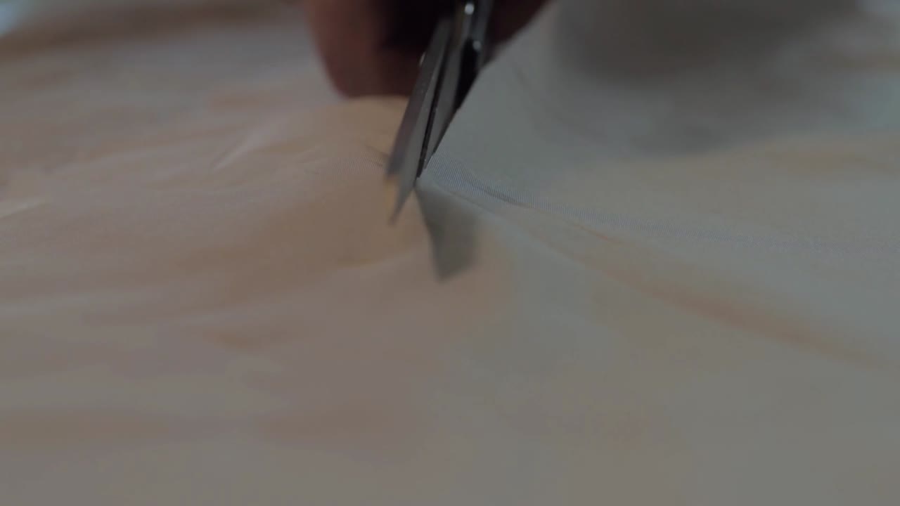 Dressmaker cutting material