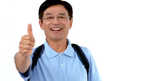 happy man with bags showing thumbs up