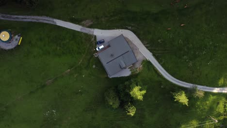 top down shot of a house in the alps in lofer, austria