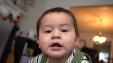 cute-adorable-hispanic-baby-boy-in-living-room