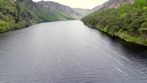 Aerial-view-of-upper-lake-in-Glendalough,-Ireland