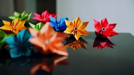 colorful origami flowers on a table