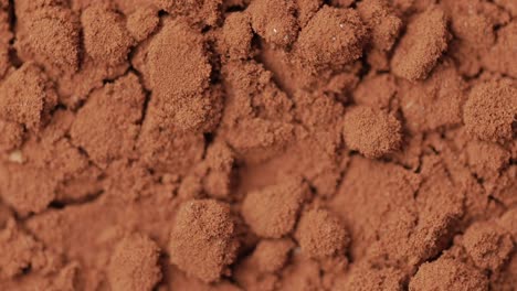 rotating cacao powder macro shot