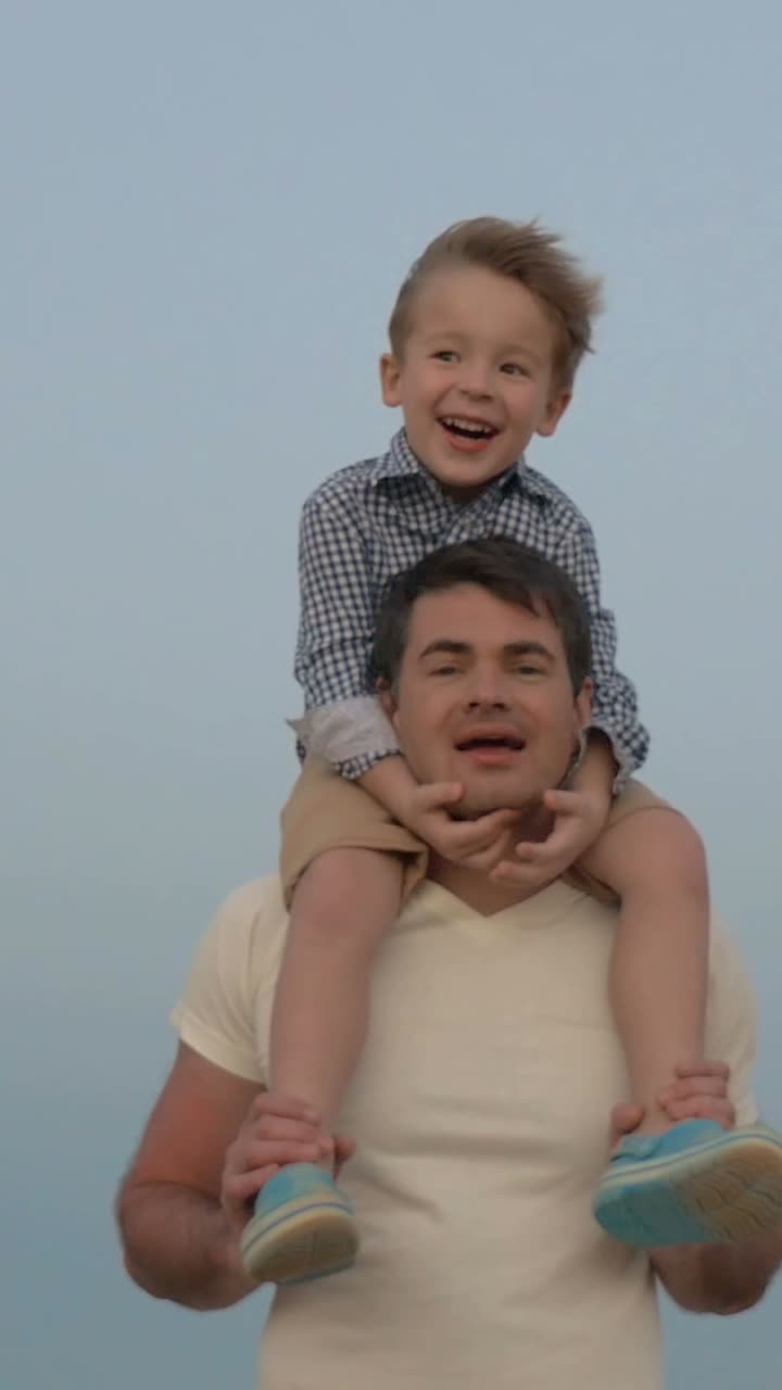 Father and Son Piggyback Ride