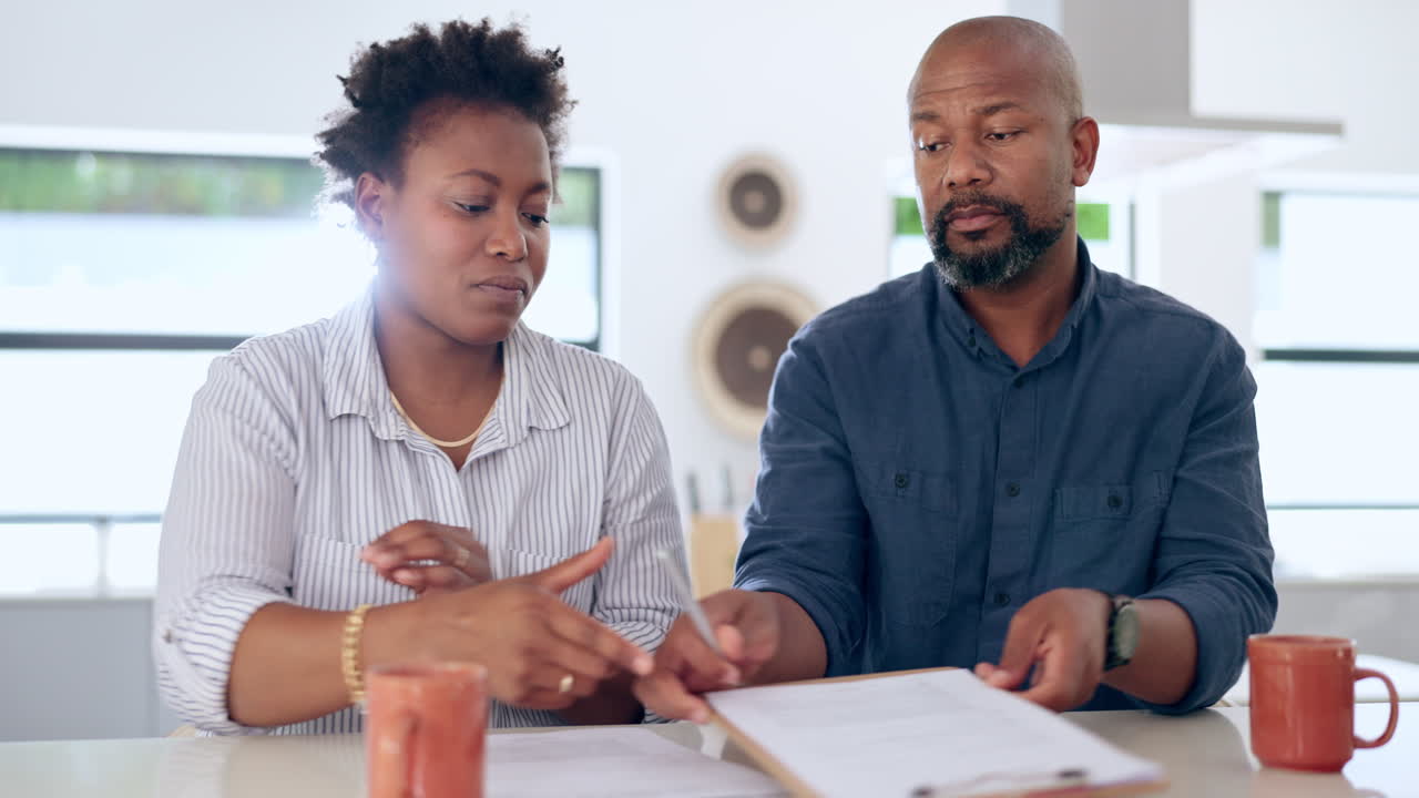 Black couple, writing and documents with lawyer
