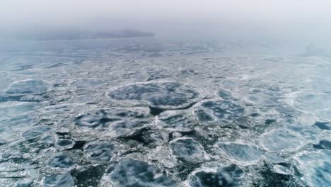 spring ice drift on the river on a cloudy day - drone collection