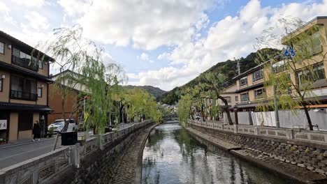 calm waterway through a traditional village