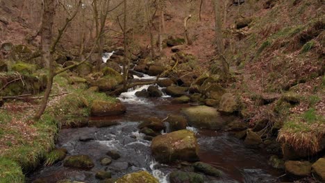 4K-Grindleford-drone-aerial-crane-shot-panning-over-Grindleford-River-revealing-Grindleford-terrain-landscape