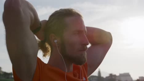 sporty caucasian man on a bridge