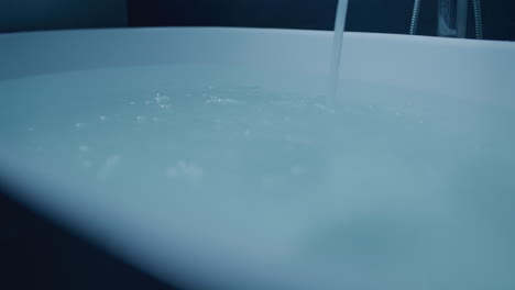 water filling a bathtub