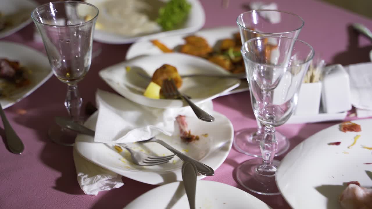 Dirty dishes on a table in a restaurant. After eating