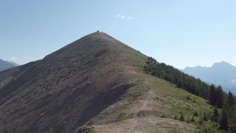 hikers descending from top cabin, rockies, kananaskis, alberta canada