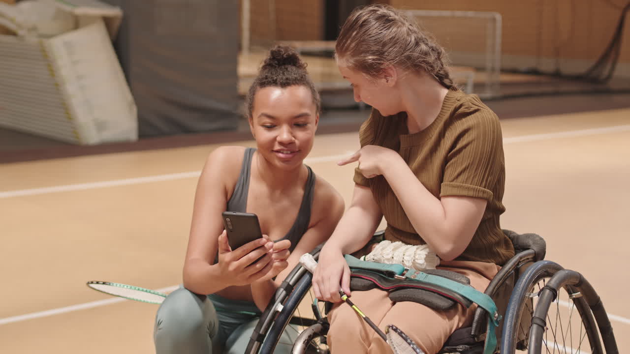 Girl with Disability Talking to Athlete
