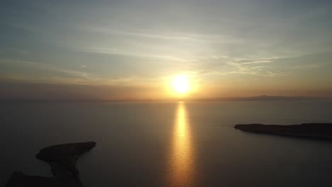 aerial shot of the sunset in partida island, archipielago espritu santo national park, baja california sur