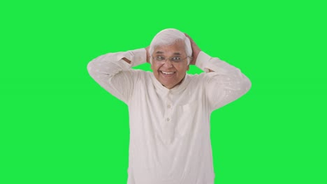 Happy-Indian-old-man-getting-ready-to-go-out-Green-screen