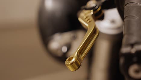 Motorcycle-handlebar-with-a-golden-gearshift