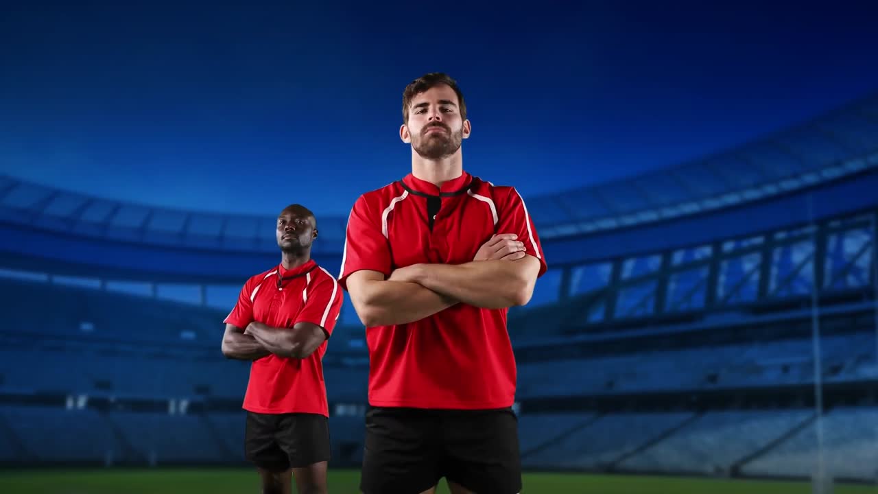 프로 럭비 선수 들 이 경기장 앞 에 서 있다