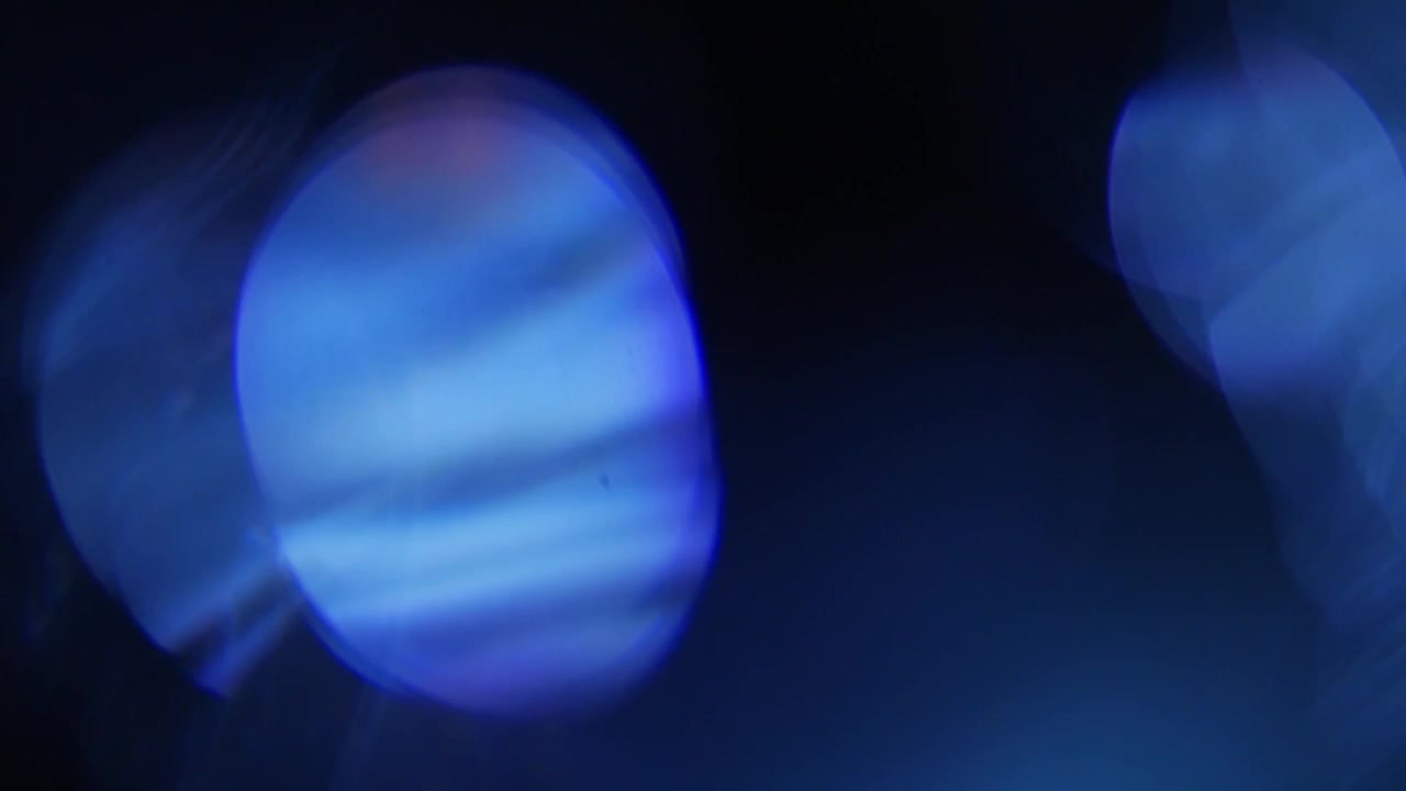 Dynamic Blue Light Leaks with Soft Bokeh Effect