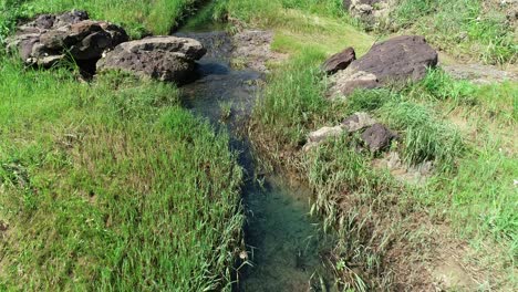 Aerial-footage-flying-over-a-creek-in-Texas