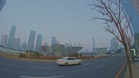 architecture buildings in a city town urban style, skyscrapers and constructions wide angle view panorama with cars on the road