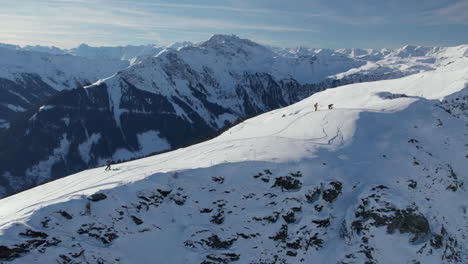 hikers on mountain ski resort reiterkogel in saalbach-hinterglemm, austria during winter