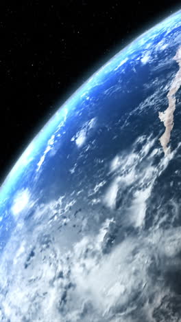 vertical format : a cinematic rendering of planet earth during sunrise as view from space with vibrant blue sky atmosphere